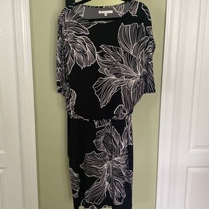 Blouson dress, black with floral design. Size 12